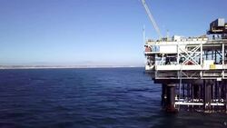 Offshore Fracking Drilling Rig in the Pacific Ocean Stock Footage
