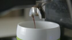 Coffee espresso machine close up slowmotion, 4K DCI PRORES HQ Stock Footage