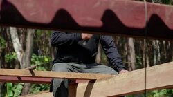 Builder hammering nail Stock Footage