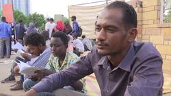 Protesters read banned books at open-air library Instructional Video