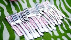 Many forks on napkin on the table. Stock Footage