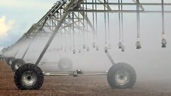 Irrigation pivot system watering agriculture field in 4K 60fps Stock Footage