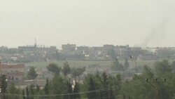 CLEAN : Smoke billows over the Syrian town of Tell Abyad located just across the border with Turkey News Clip