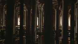 PAN LEFT TO RIGHT OF UNDERGROUND TEMPLE OR MOSQUE. STONE PILLARS WITH ORNATELY CARVED ARCHES STAND WITHIN REFLECTION POOL. WATER.  WALK WAYS. COULD BE MAUSOLEUM. Stock Footage