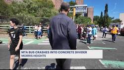 MTA bus collides with concrete divider in Morris Heights News Clip