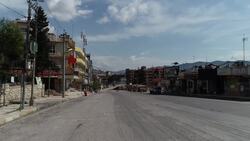 Aerials of city under curfew show empty streets Instructional Video