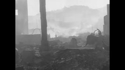 Smoldering ruins and displaced people after huge fire in port city of Pusan, South Korea, November 1953 News Clip