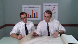 MS Two businessmen sitting at table, looking at architectural plans and discussing/ Man measuring plans with protractor/ New York City Stock Footage