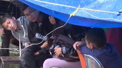 CLEAN : Aftershocks in Indonesia spur locals to scramble for safety News Clip