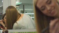 Beautiful girl in a beauty salon Stock Footage