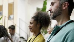 Business professionals at convention center Stock Footage