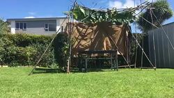 Jewish Couple Building a Sukkah on Sukkoth Feast of Tabernacles Jewish holiday Stock Footage