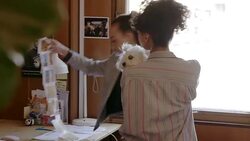 Creative designers discussing photographs in office meeting Stock Footage