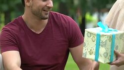 Anniversary congratulations from wife to husband, present box, happily married Stock Footage