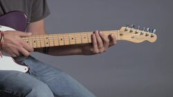 How to Play a D Minor Barre Chord on Guitar Instructional Video