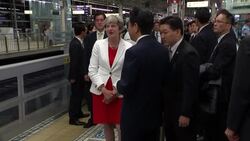 Theresa May and Shinzo Abe visit train station News Clip