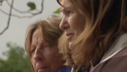 UK: Crowds of people gather to line streets of London for the state funeral of Her Majesty Queen Elizabeth News Clip