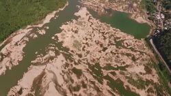 CLEAN : Controversial Laos dam launches along dried out Mekong News Clip