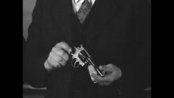 Guns and money seized from gangster Basil Banghart's Baltimore hideout News Clip