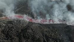 Sicily's Mount Etna Erupts: Drone Captures Snow-Clad Lava Flow Stock Footage