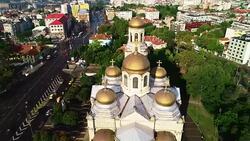 The Cathedral of the Assumption in Varna, Bulgaria and colorful rainbow. Aerial drone view. Stock Footage