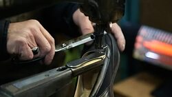 Shoemaker repairer sew the shoes Stock Footage