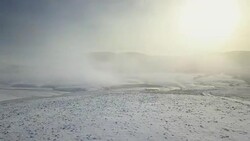 Fog above lakes in winter landscape Stock Footage