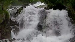 View waterfall scenes in mountains, national park Dombai, Caucasus, Russia Stock Footage