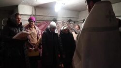 CLEAN : Ukrainians near the front celebrate Orthodox Christmas in a bomb shelter News Clip