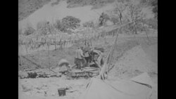During Korean War, US Marines in South Korea attack communist positions News Clip