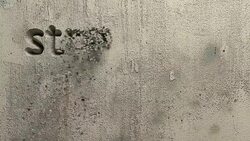 stressless living word carved in a grey wall Stock Footage