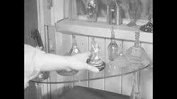 Perfume bottle display in Toronto News Clip