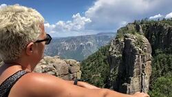 Woman contemplating the copper canyon Stock Footage