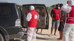 Libyan Red Crescent recover bodies washed ashore Instructional Video