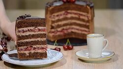 Chocolate cake with cherries and chocolate cream. Stock Footage