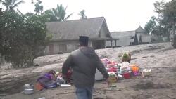 Indonesians flee erupting volcano News Clip