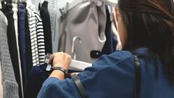 Customer in clothing store Stock Footage