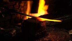 Hot metal workpiece for the manufacture of clad steel on the anvil Stock Footage