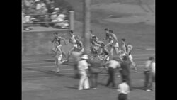 Ferrin Walker wins 100-meter dash and Cunningham surpasses a fallen San Romani to win 1500 meter race at 1937 AAU Nationals News Clip