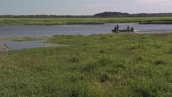 Men riding in a boat in the . Editorial Use Only. Stock Footage