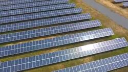Aerial View: Rows Solar Panel Power Plant Providing Clean Renewable Energy Stock Footage