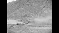 South Korean soldiers fire artillery guns during Korean War in 1951 News Clip