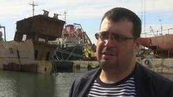 Greece pulls abandoned, half-sunken ships out of the sea Instructional Video