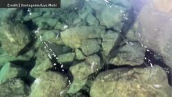 #TheMoment Alaskan skaters glide over astonishingly clear ice on an alpine lake News Clip