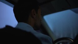 Robber stealing car, threatening victim with gun, urban criminal activity Stock Footage