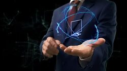 Businessman shows concept hologram 3d TV on his hand Stock Footage