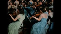 Musicians placing strings instruments, 1950s Stock Footage