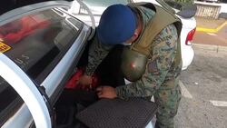 CLEAN : Ecuador soldiers stop and search citizens News Clip