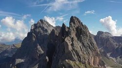 AERIAL VIEW OF DOLOMITES Val di Funes Stock Footage