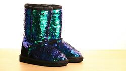 Girl shoes wooden table white background hd footage Stock Footage